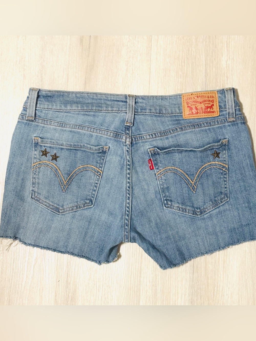 LEVIS 535 Super Skinny distressed embroidered metallic stars cut out Jean shorts